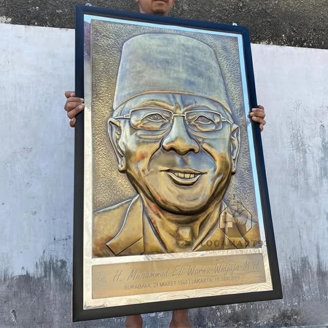 Custom Brass Relief Hero Carving Motif