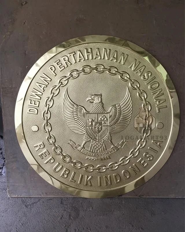 Custom Brass National Defense Council Logo